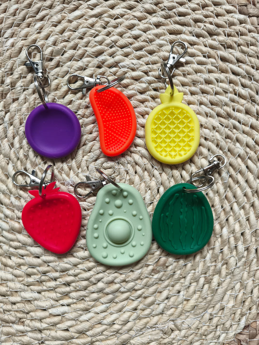 Porte clé pierre sensorielle en silicone texturé
