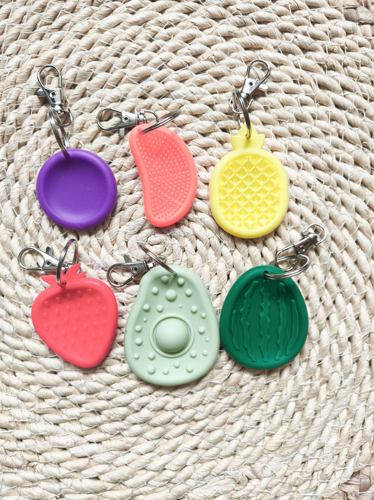 porte clé worry-stone en silicone texturé